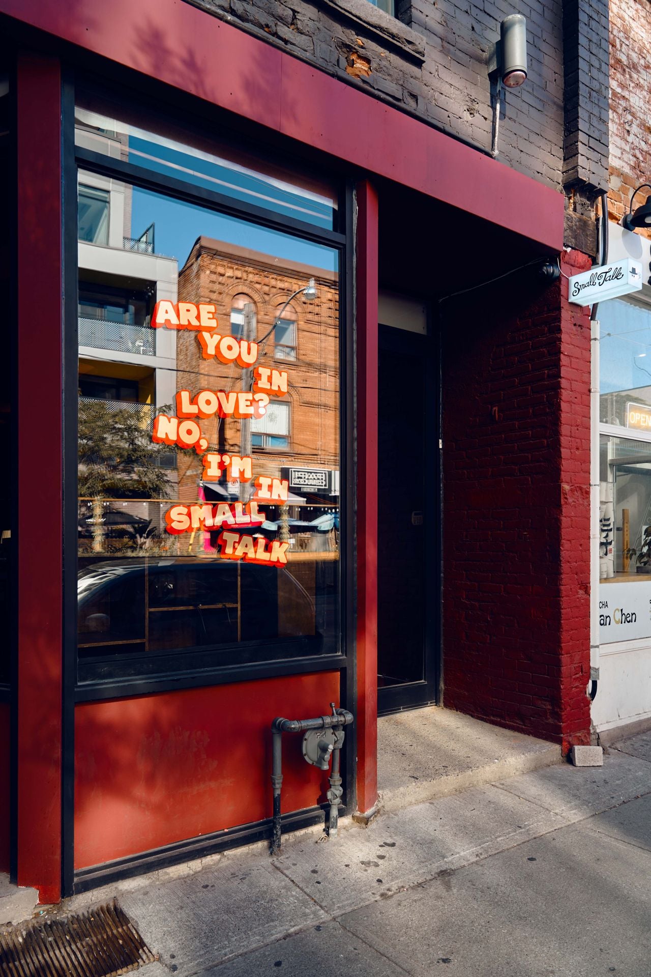 The exterior of Small Talk, a bar in Toronto