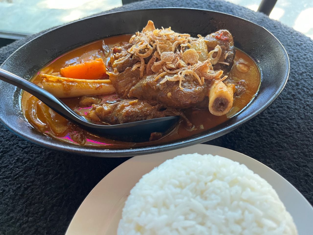Lamb shank massaman curry and white rice