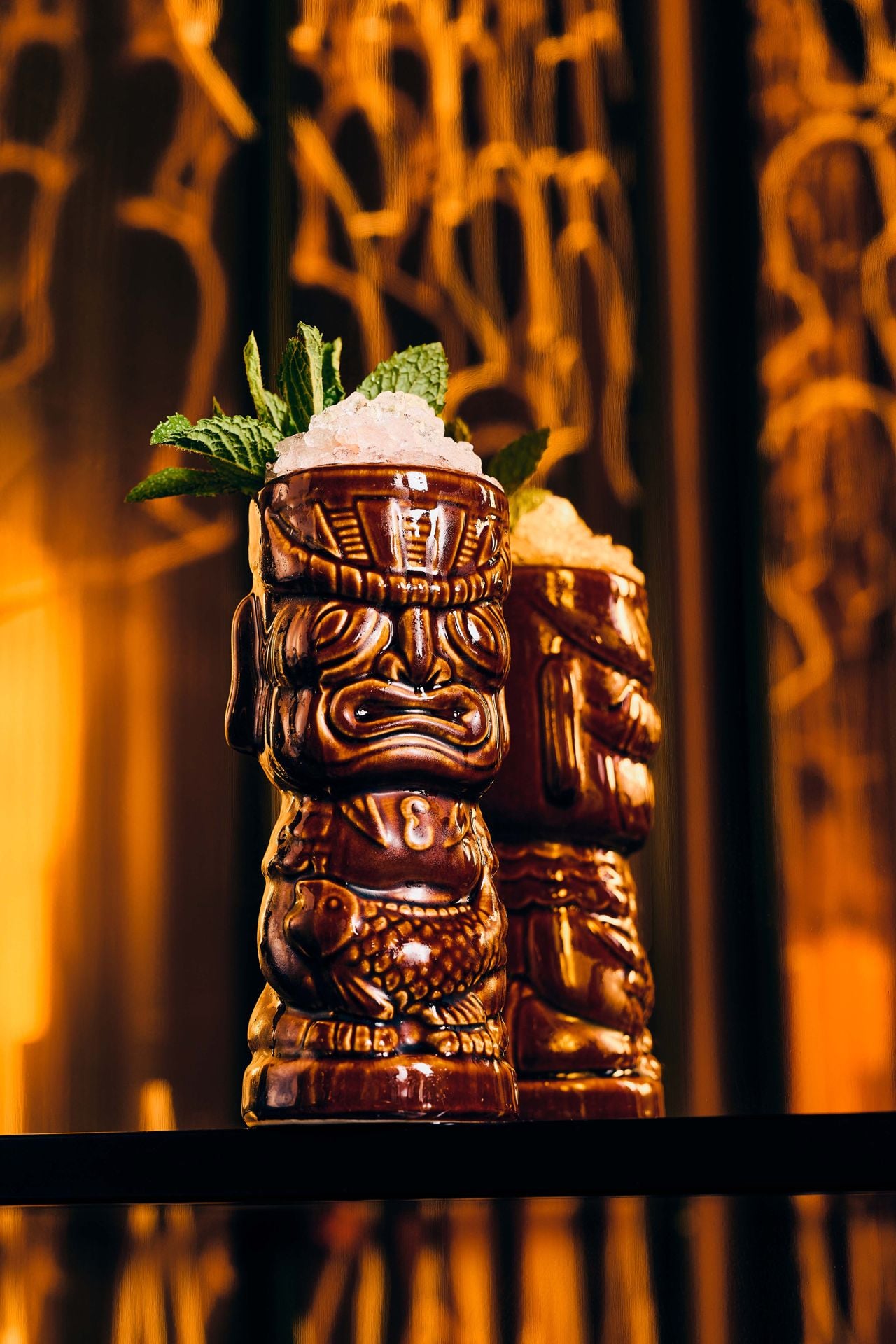The Wakie Wakie is a zero-proof tropical cocktail served in a Tiki mug