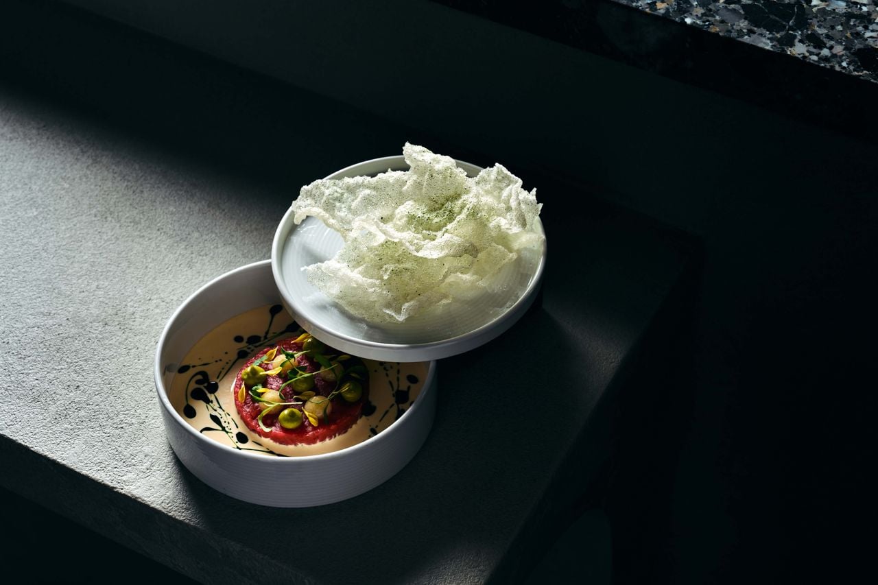 For the Tono tartare, a tower of chopped bluefin tuna rests in a velvety leche de tigre