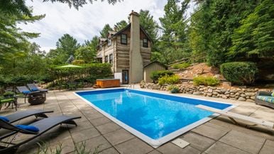 Surreal Estate: $2.9 million for a log cabin hidden in the forested hills of King Township