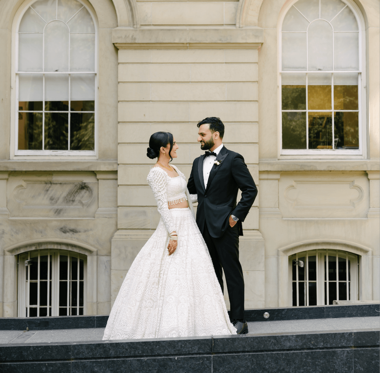 Bride and groom embracing