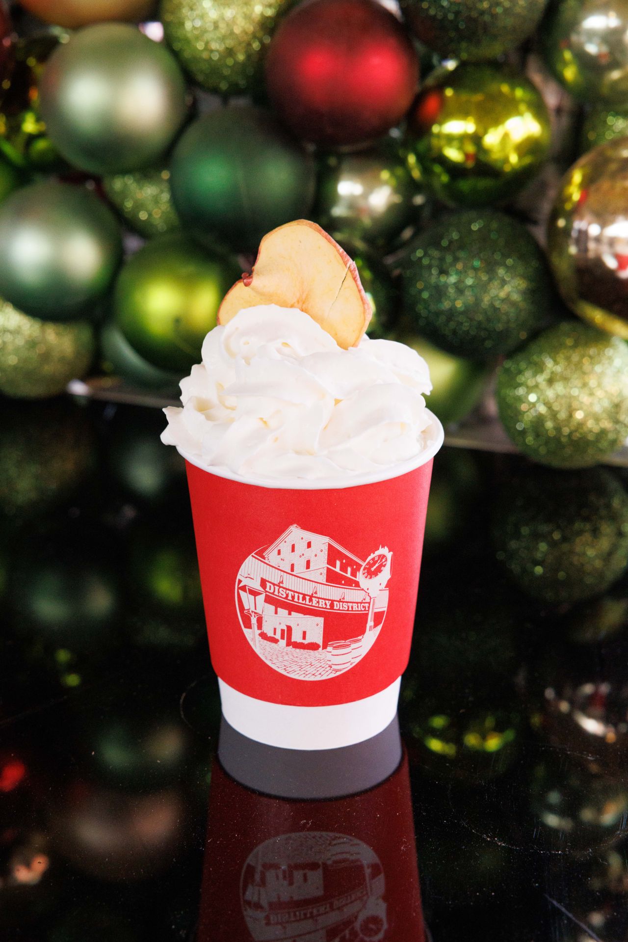 A festive drink topped with whipped cream