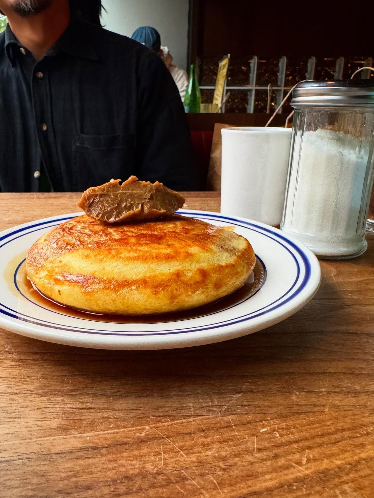 A pancake topped with cultured butter