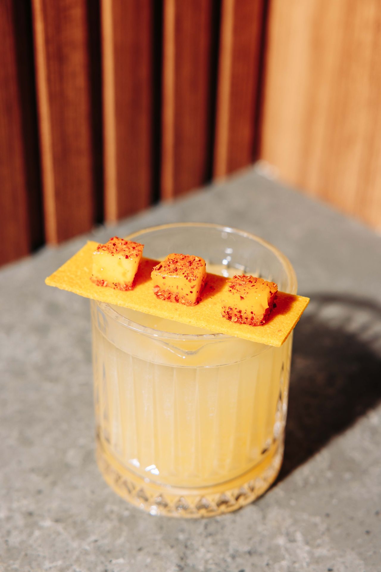 The Mango Chipotle Clarified Cocktail combines the earthy spice of chipotle and the smooth kick of tequila with the fruity depth of mango