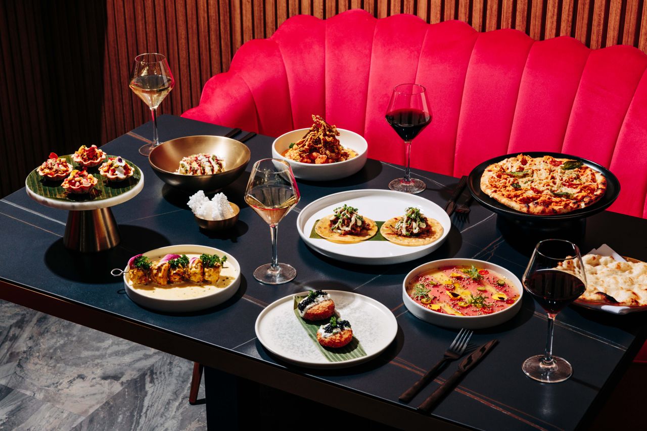 A spread of dishes and drinks at ORO