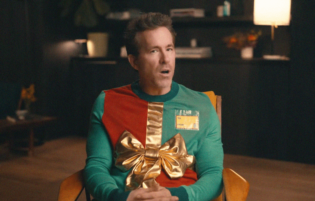 Ryan Reynolds backs the Blue Jays in his ugly Christmas sweater