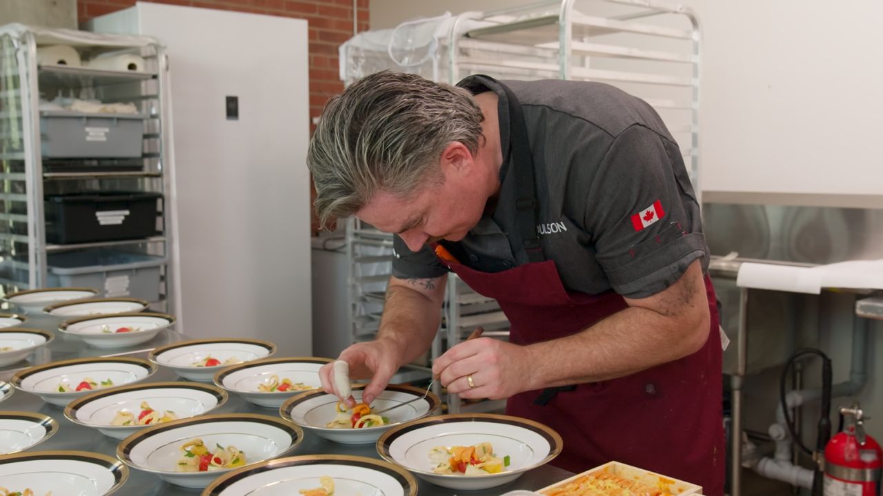 Chef Coulson Armstrong finishes plates