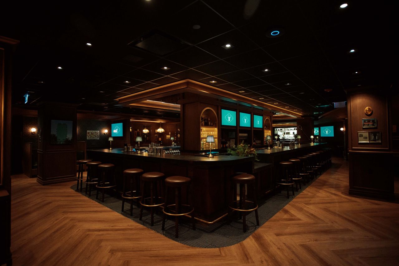 The Iron Cow Public House's horseshoe-shaped bar