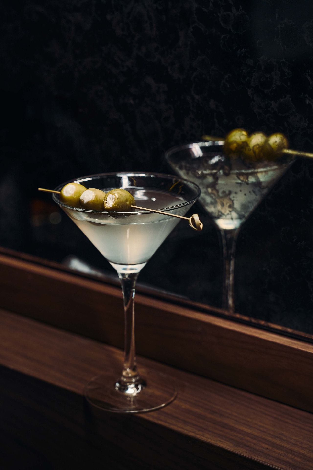 Vodka, dry vermouth and sherry meet a brine that’s equal parts feta brine and green olive brine in the house dirty martini