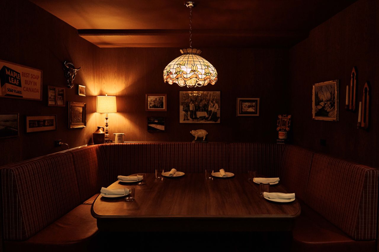 A large booth in the dining room of the Iron Cow Public