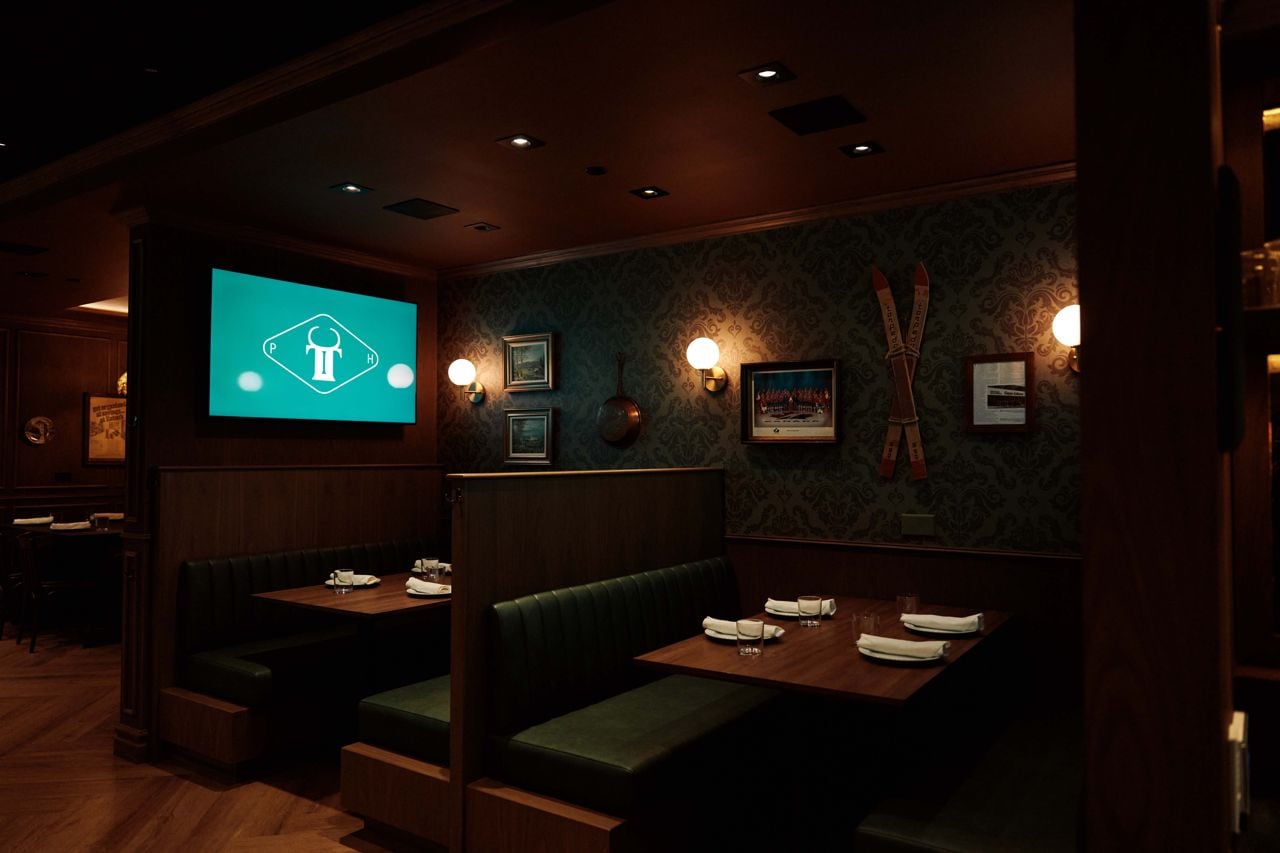 Booth seating at the Iron Cow Public House
