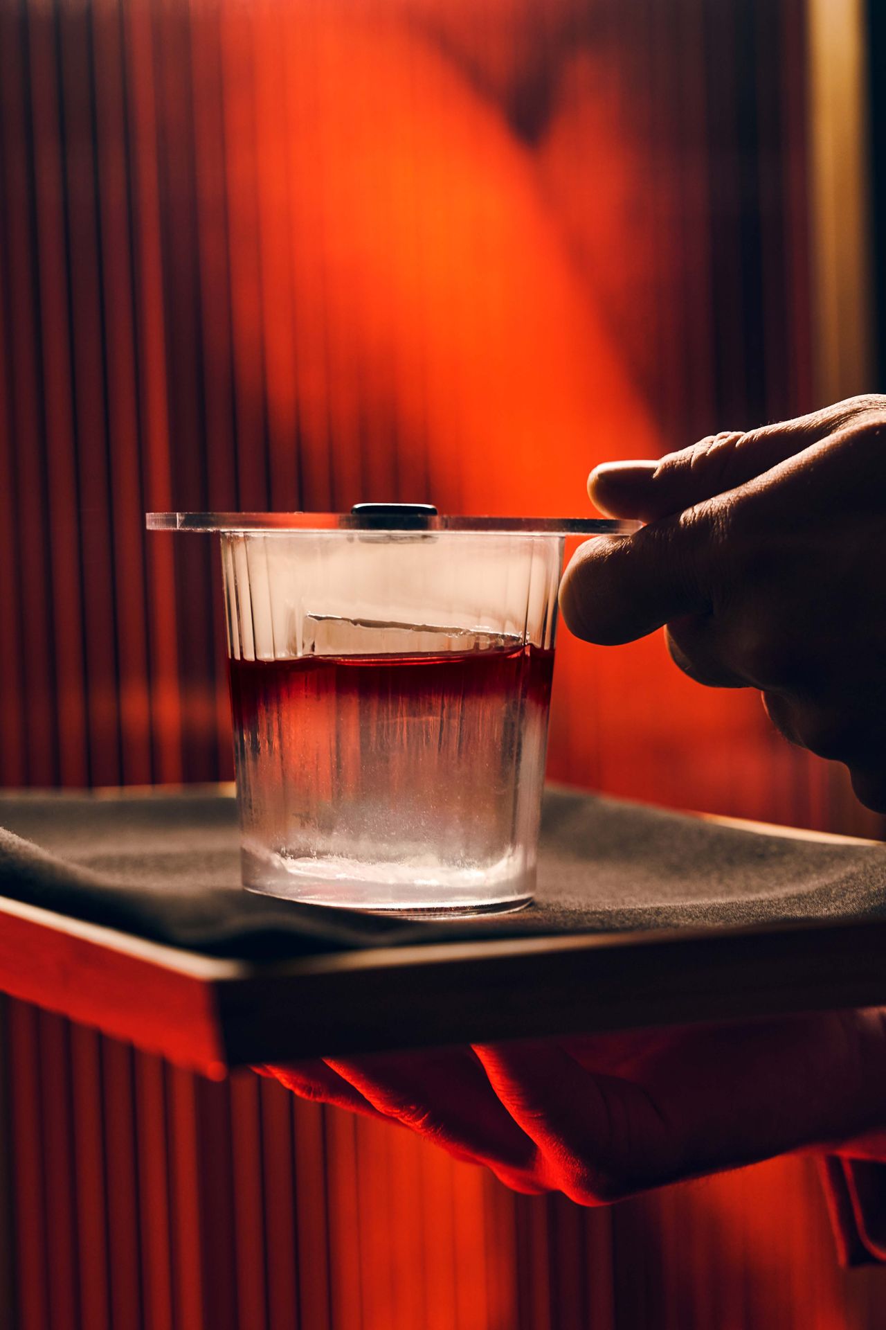 The Old Flame cocktail at Powder Room, prior to releasing the smoke from the glass
