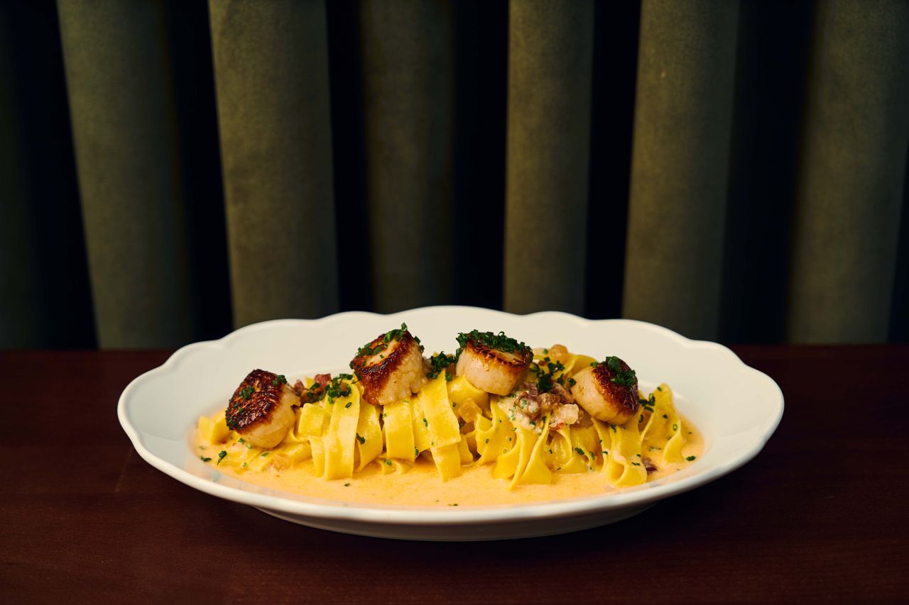 House-made linguine topped with scallops