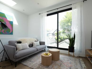 This Riverdale laneway suite has a rental unit up top and a carport down below