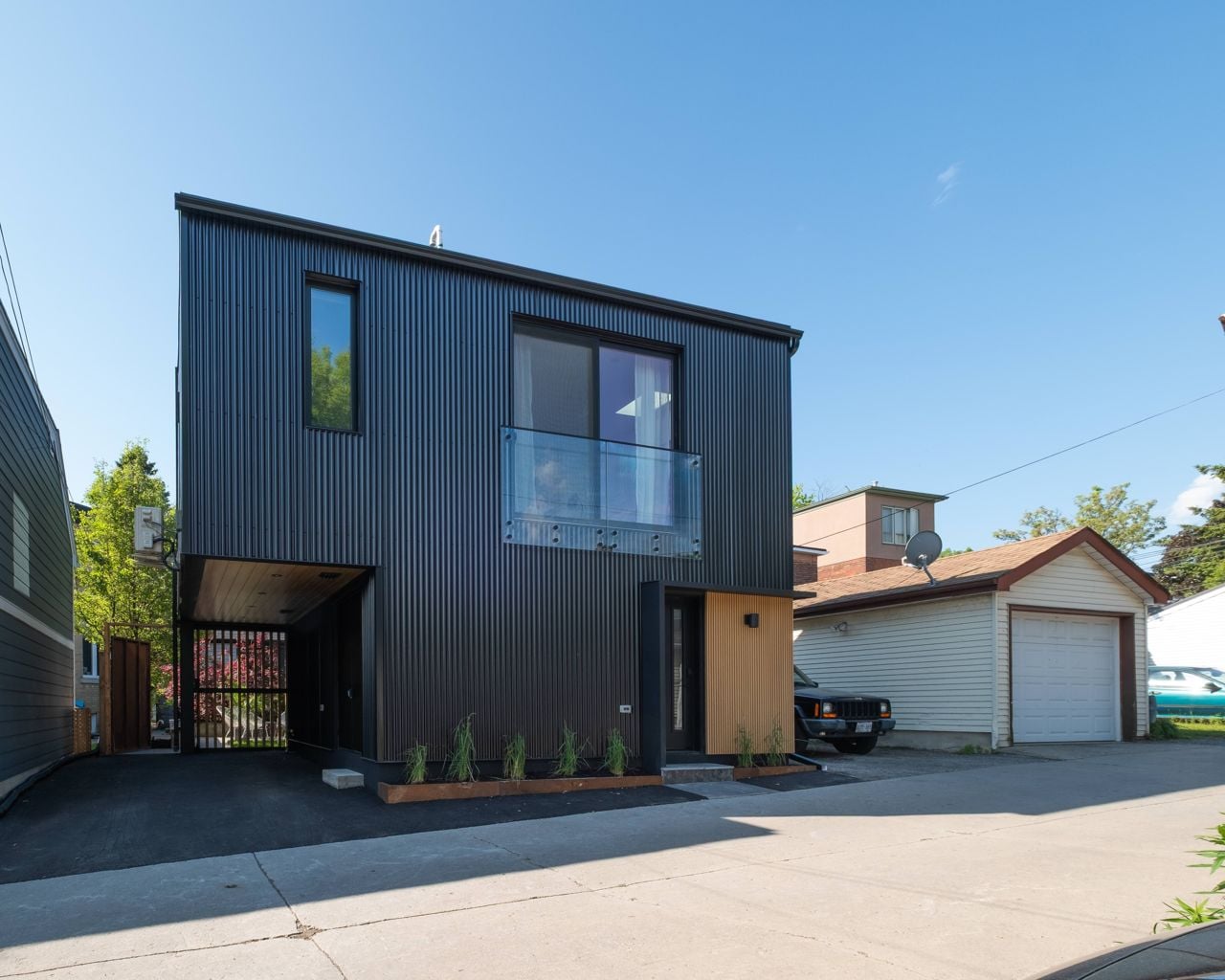 toronto-real-estate-laneway-suite-riverdale-lanescape-rental-unit-2 This Riverdale laneway suite has a rental unit up top and a carport down below