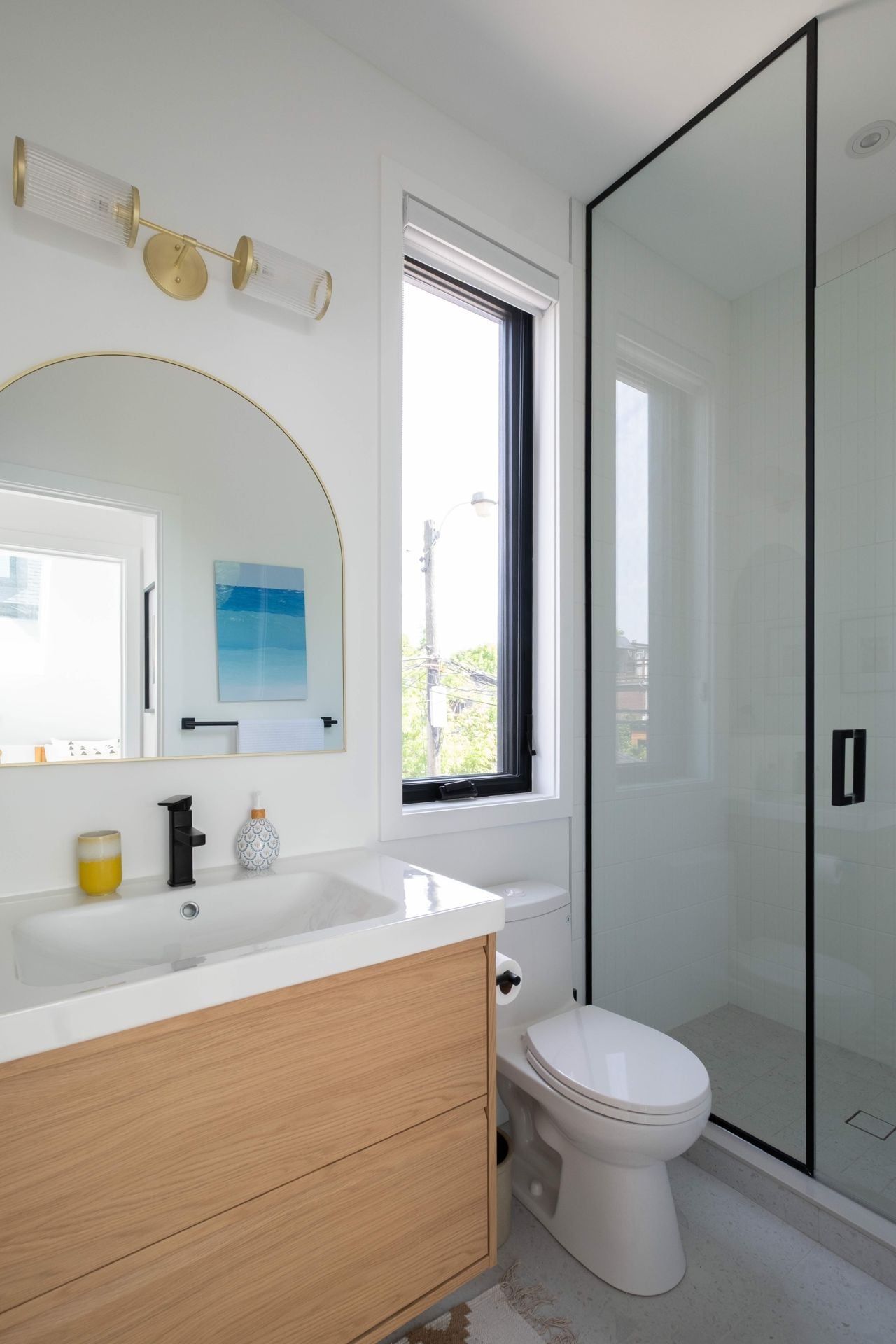 This Riverdale laneway suite has a rental unit up top and a carport down below