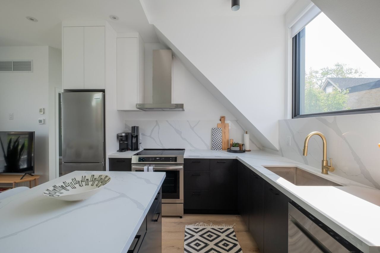 toronto-real-estate-laneway-suite-riverdale-lanescape-rental-unit-7 This Riverdale laneway suite has a rental unit up top and a carport down below