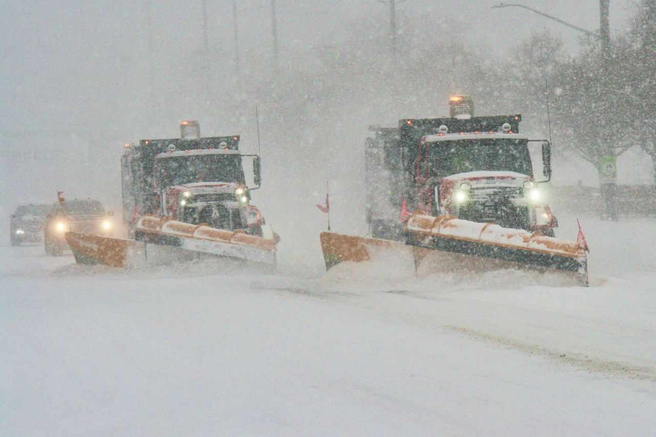 Watch a snowplow hit a parked car on a Toronto street