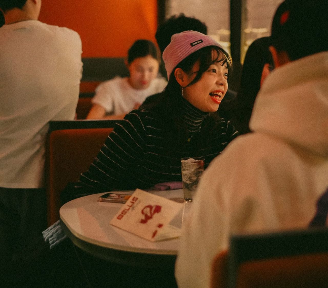 People in the dining room at Bellis, a restaurant in Toronto