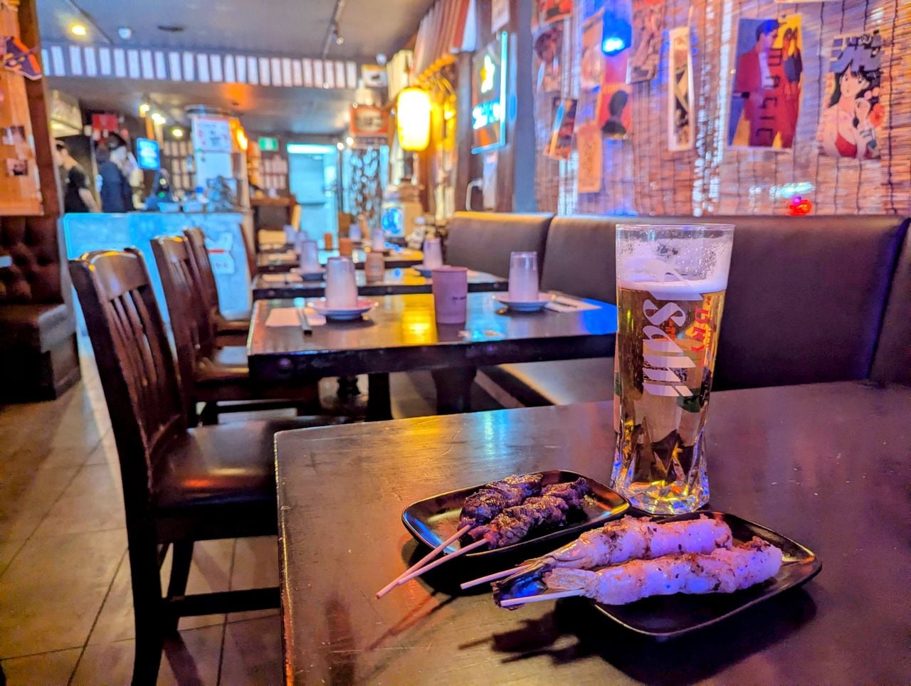 Yakitori skewers and a pint of beer