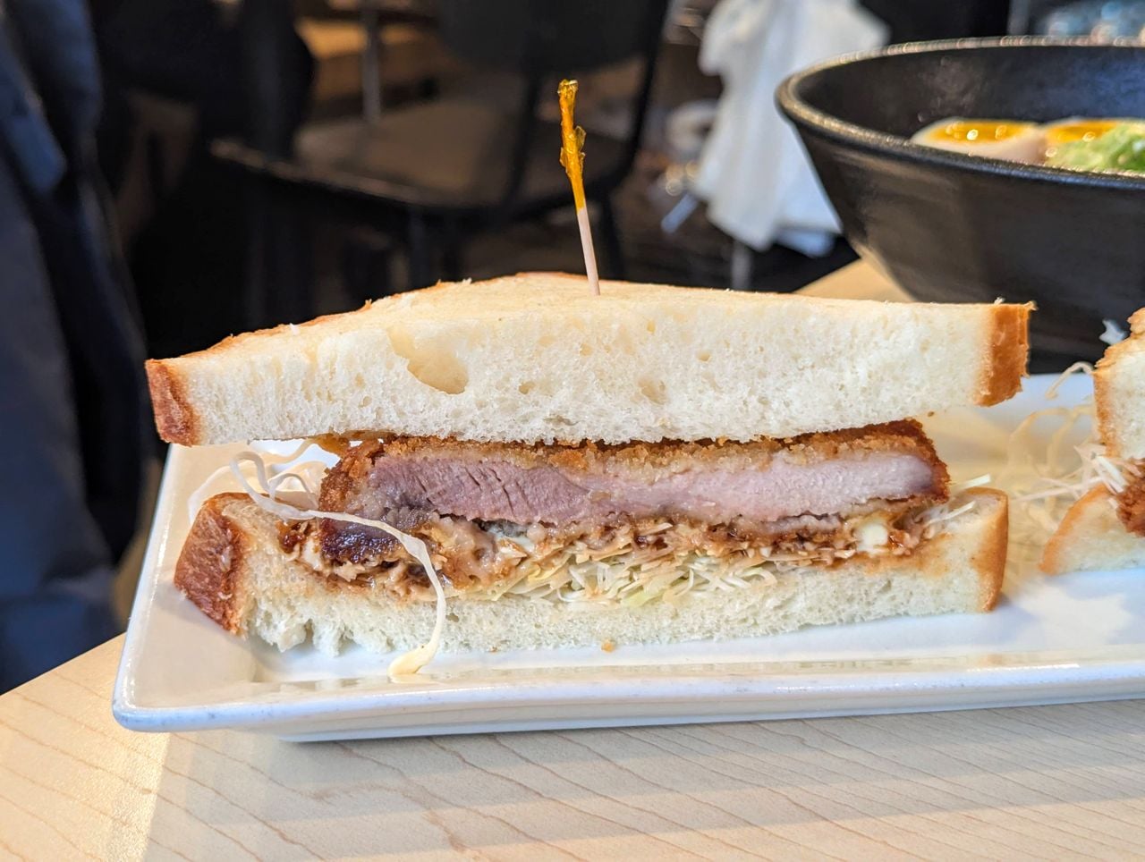 A closeup of a tonkotsu pork sandwich
