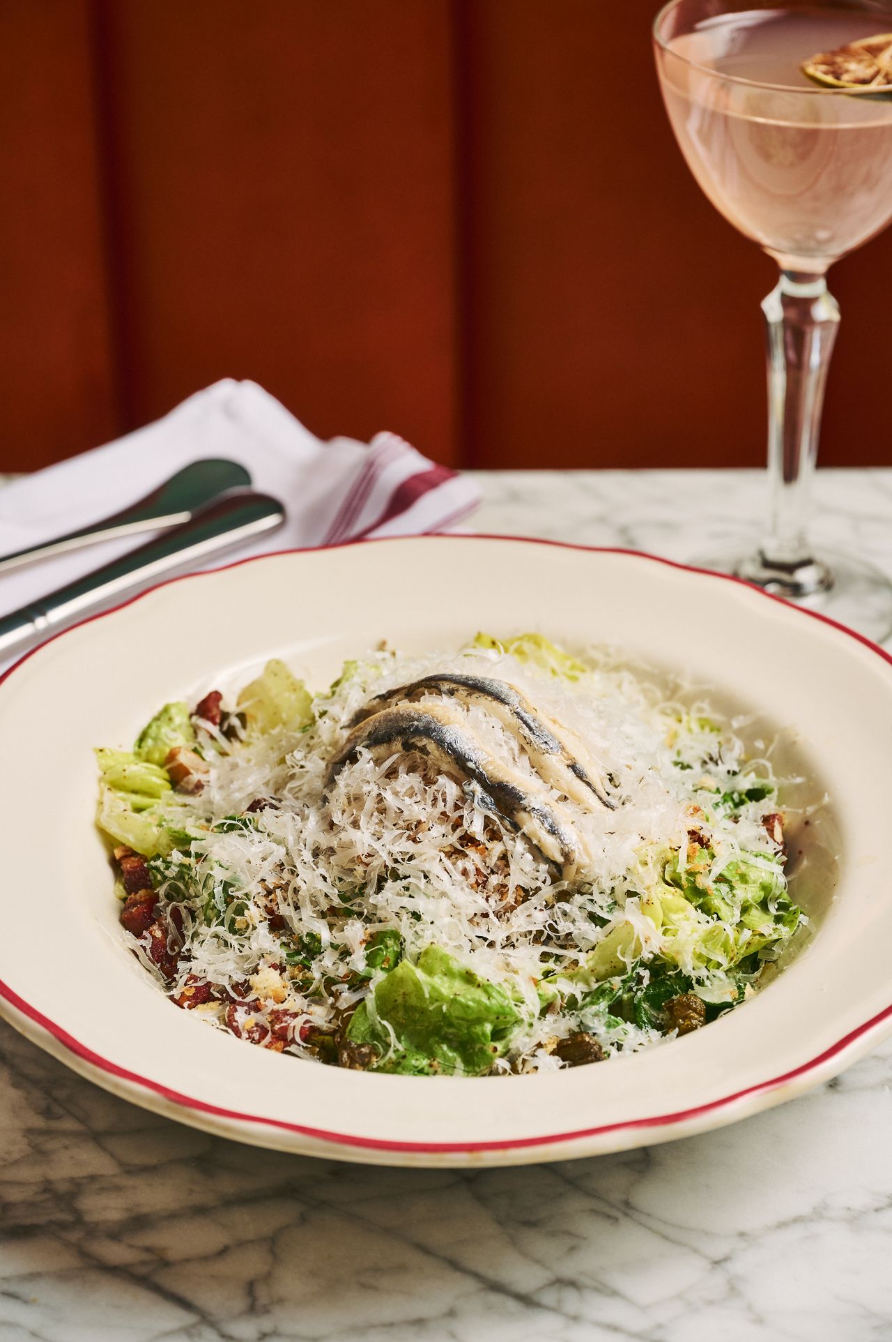 A baby gem caesar salad