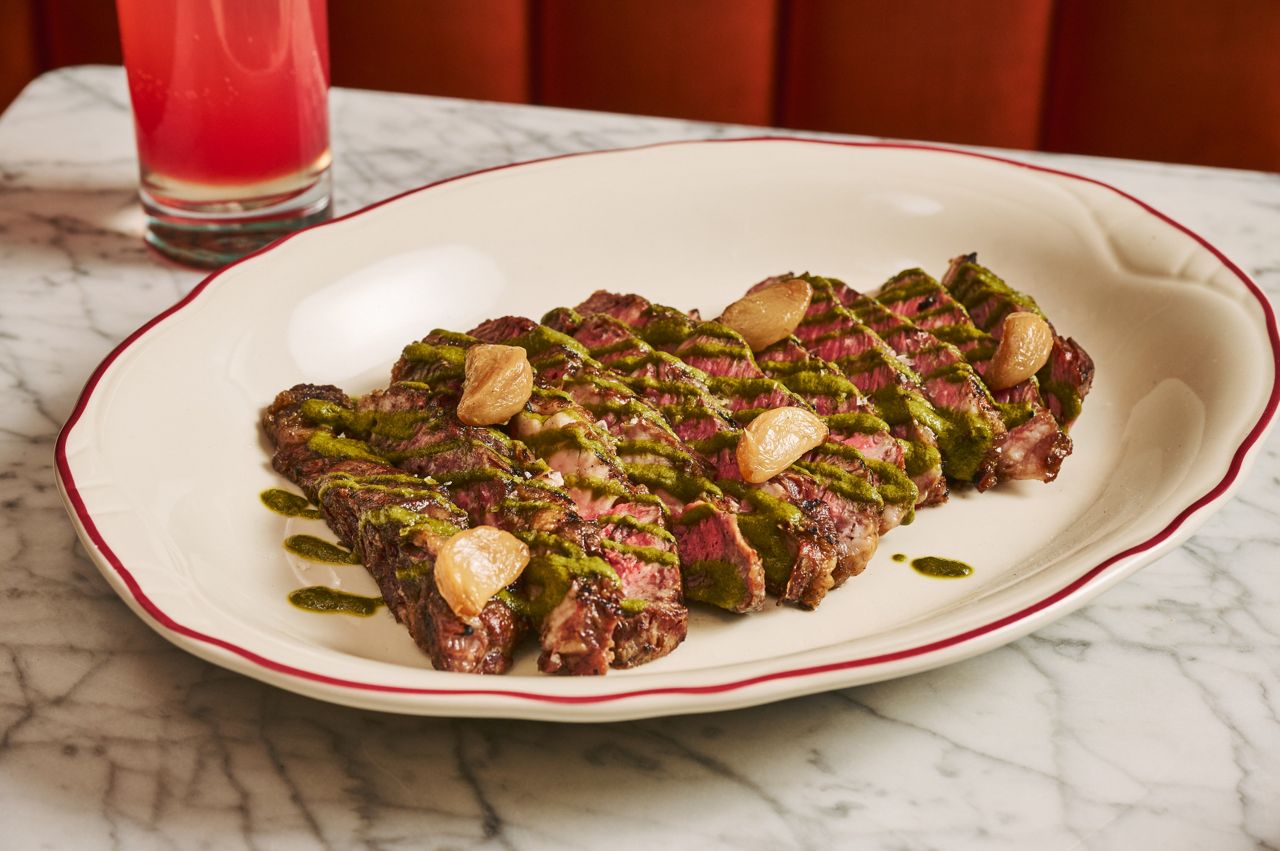 Steak with salsa verde and confit garlic