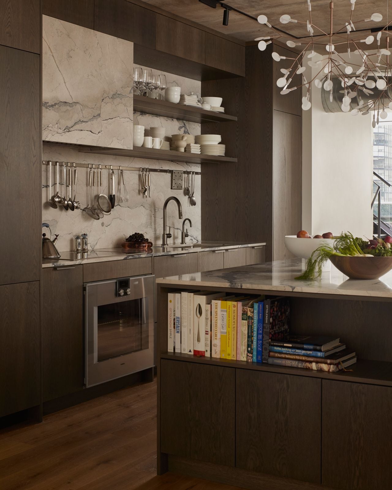 This couple downsized into an elegant two-storey condo—and their daughter handled interior design