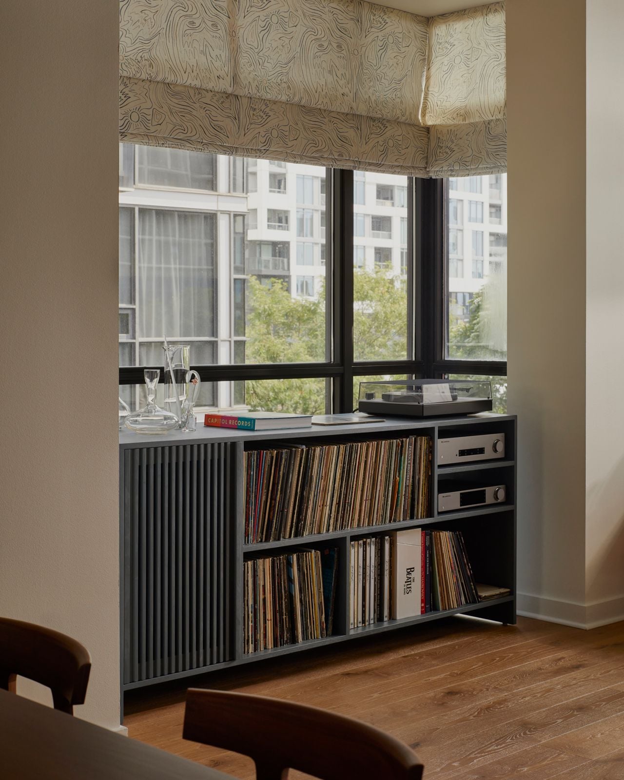 This couple downsized into an elegant two-storey condo—and their daughter handled interior design