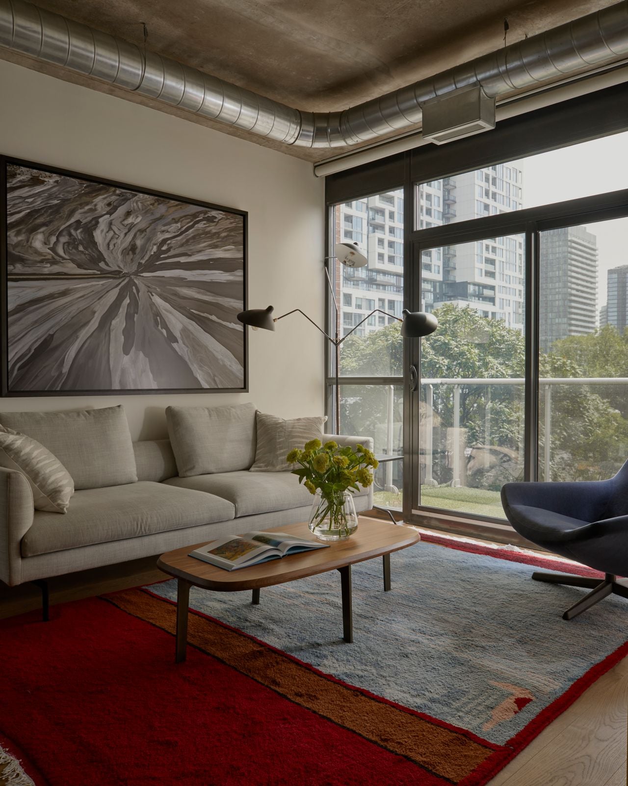 Black and white print above a couch