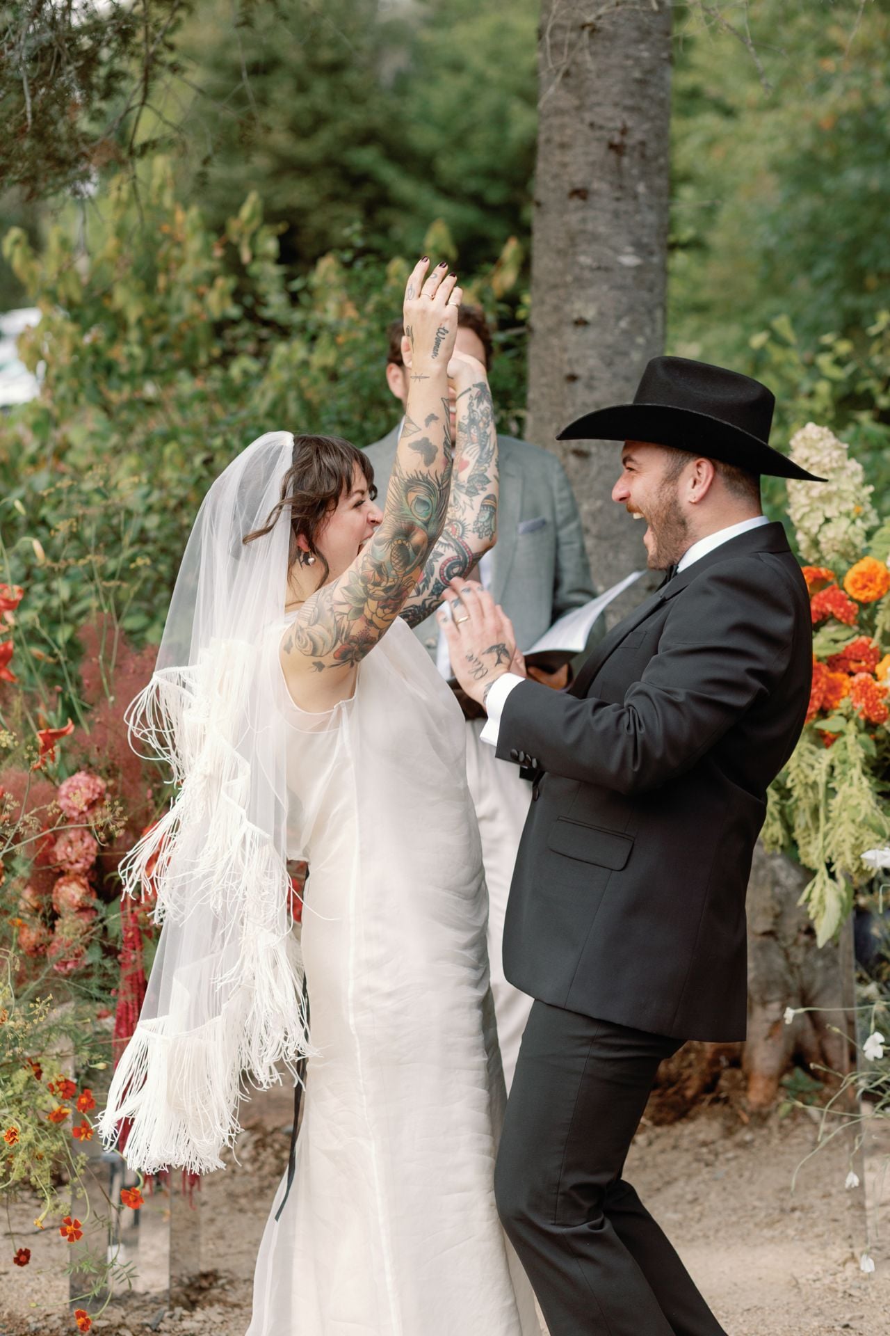 Inside a disco rodeo–themed wedding at a log cabin