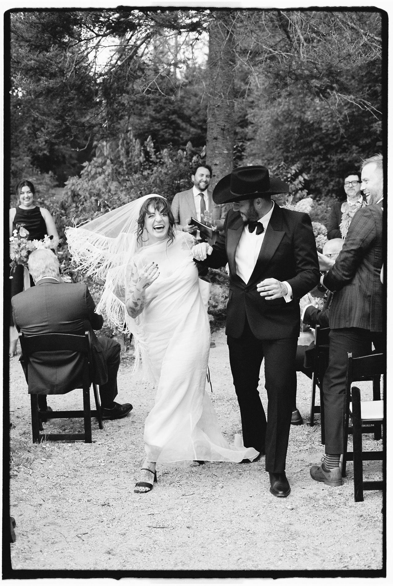 Inside a disco rodeo–themed wedding at a log cabin