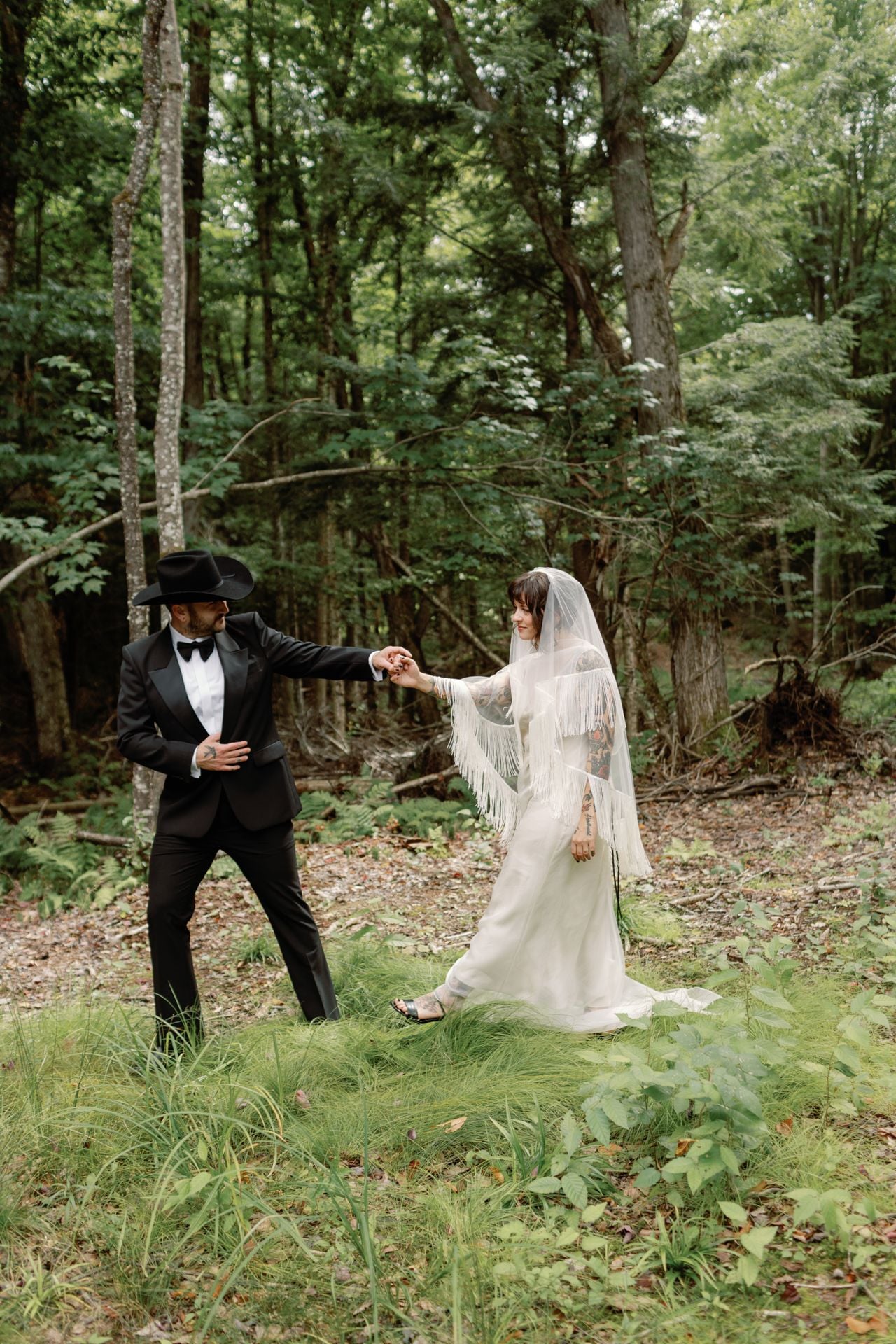 Inside a disco rodeo–themed wedding at a log cabin