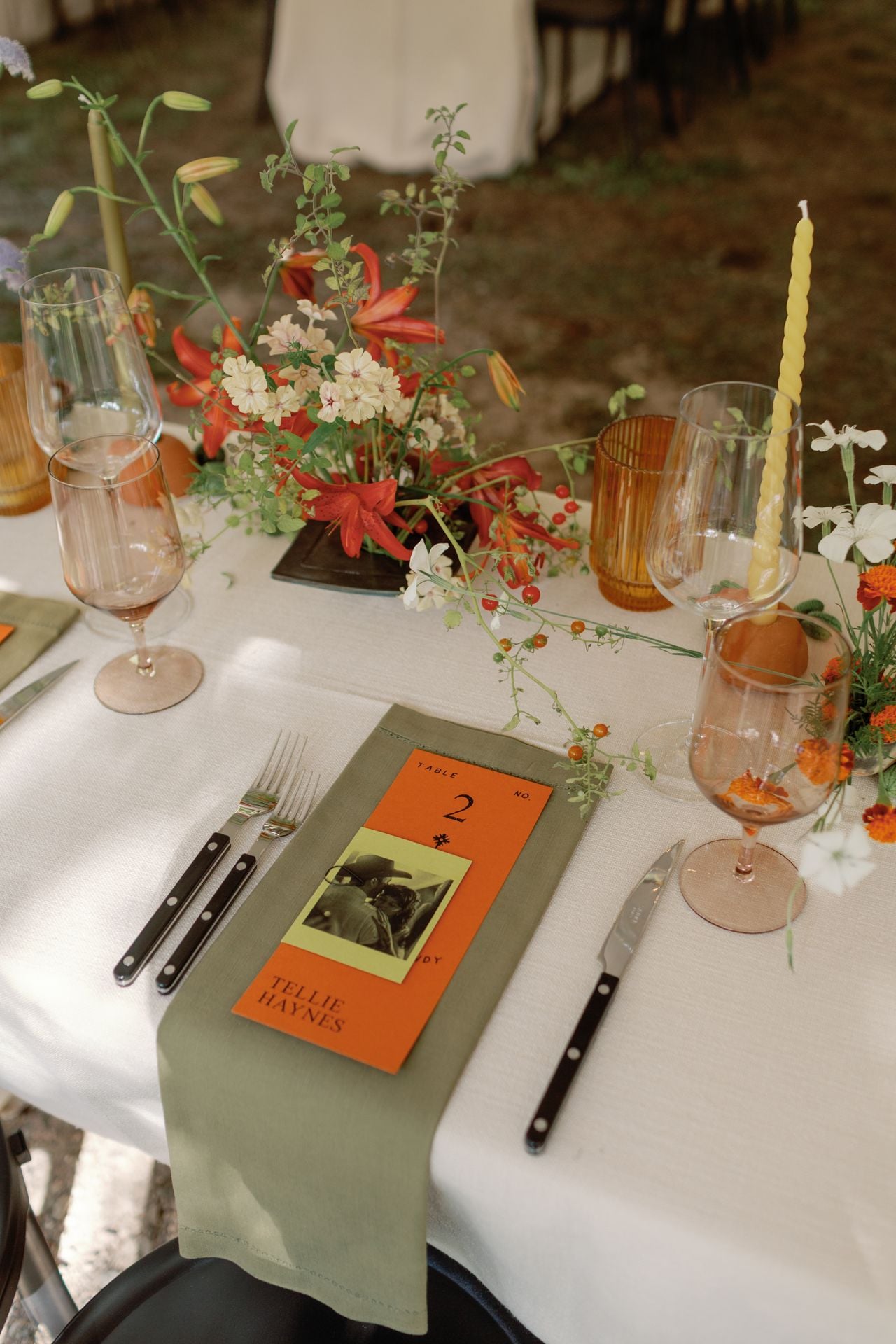 Inside a disco rodeo–themed wedding at a log cabin