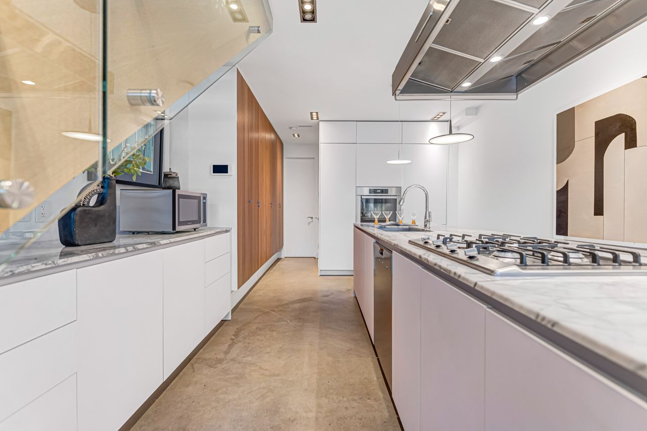 toronto-life-real-estate-trinity-bellwoods-detached-skylights-gabion-wall-backyard-8 $3 million for a vertical curio with programmable fireplaces