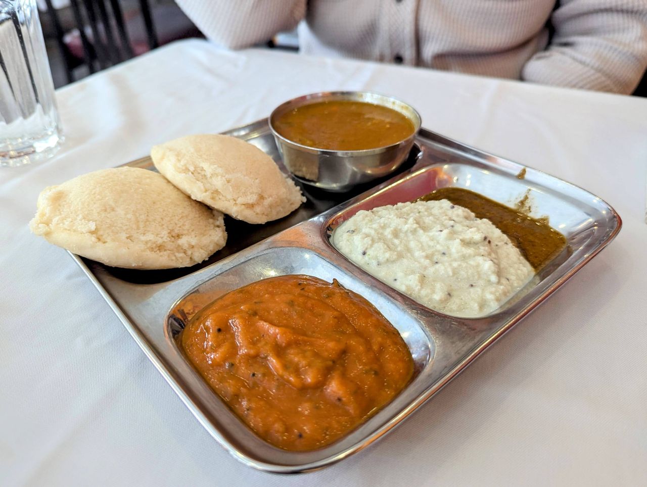 Idlii with dipping sauces at Madras Masala