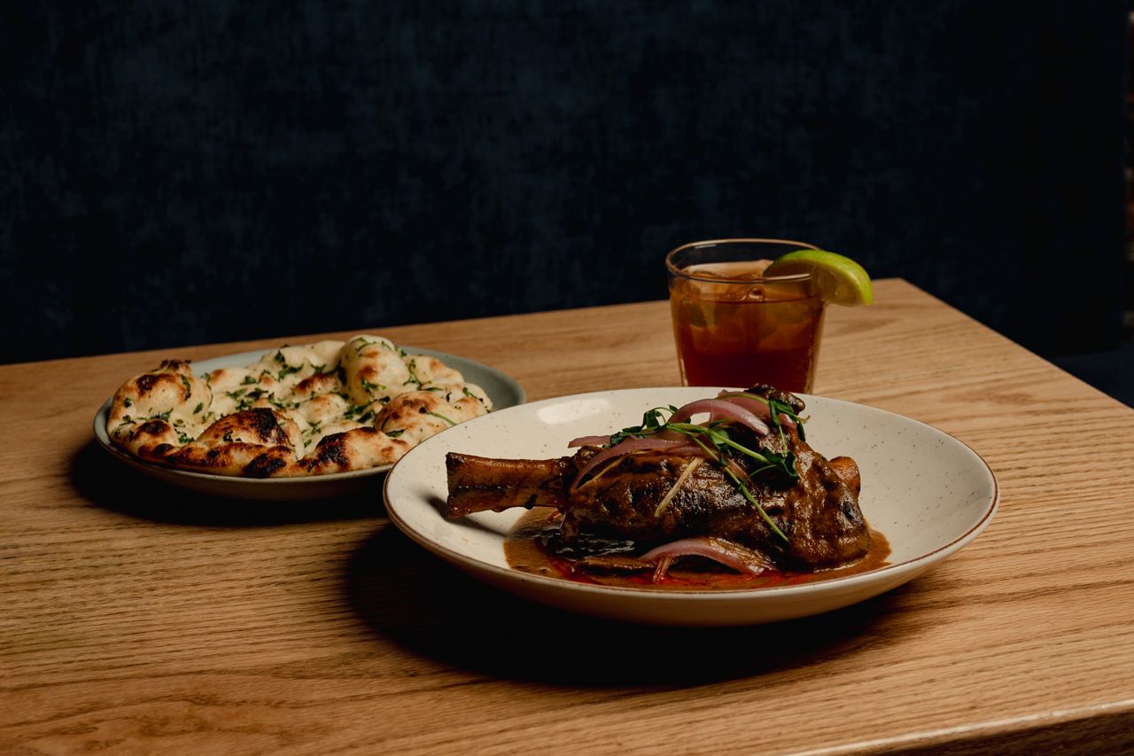 Small plates and a cocktail at Neon Tiger, an Indian snack bar in Toronto