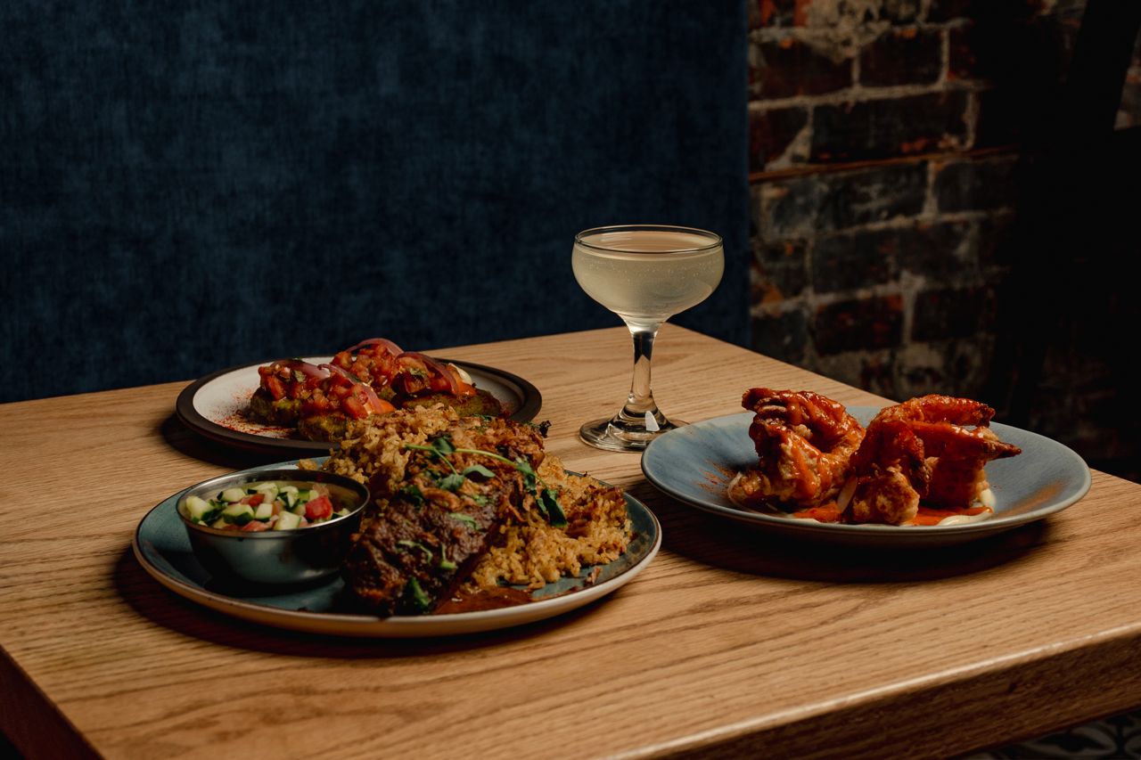 Small plates and a cocktail at Neon Tiger, an Indian restaurant and bar in Toronto