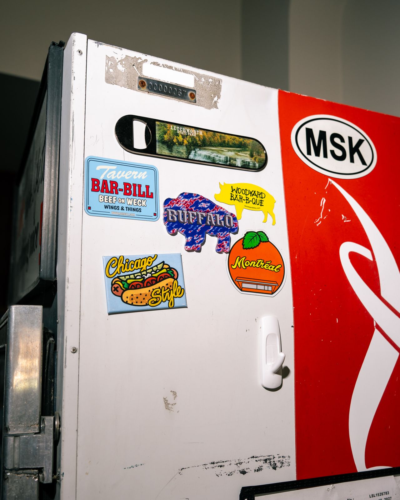 A fridge decorated with stickers