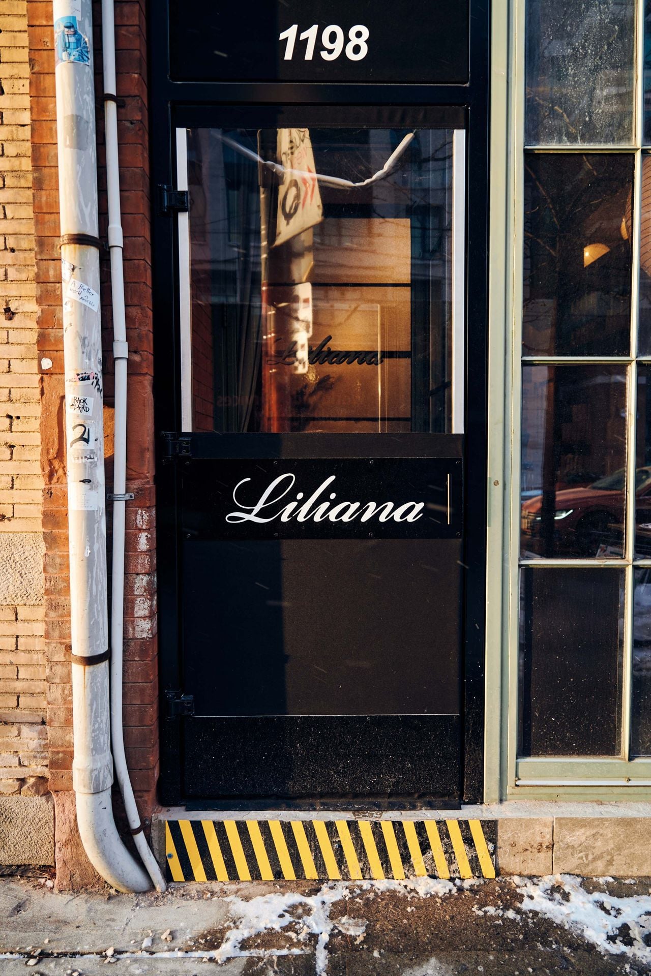 The entrance to Liliana, a restaurant on Queen Street West in Toronto