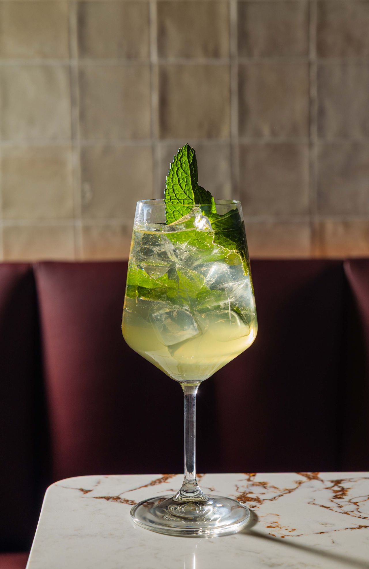 The Alba Spritz combines Prosecco, Campari and gin with a hit of Japanese yuzu