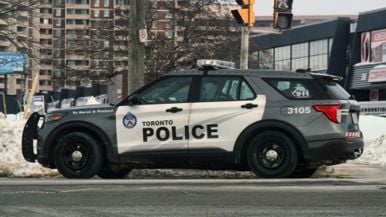 A Toronto police officer has been charged with sexual assault and suspended with pay