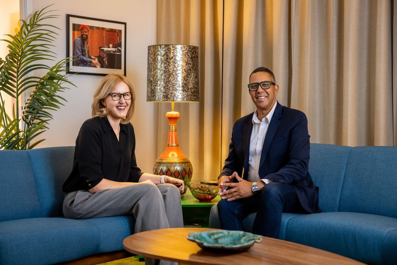 Two people in a groovy office