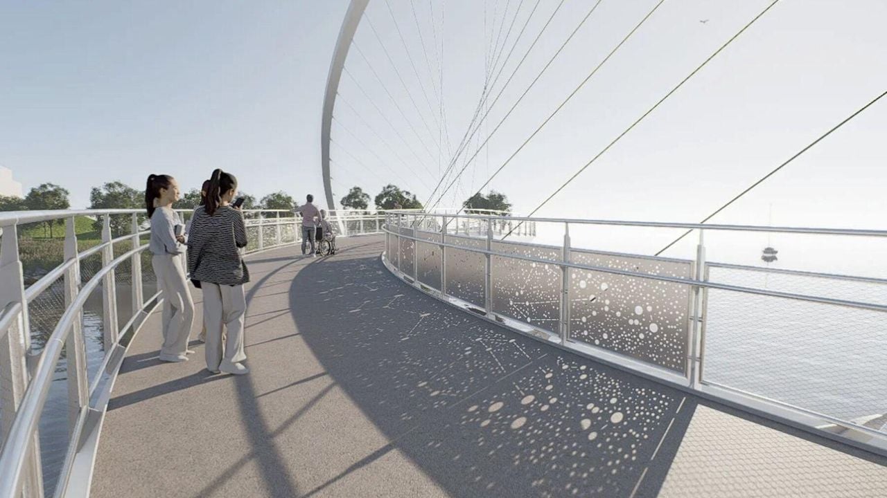 A curvy new pedestrian bridge will link the central waterfront to the Port Lands