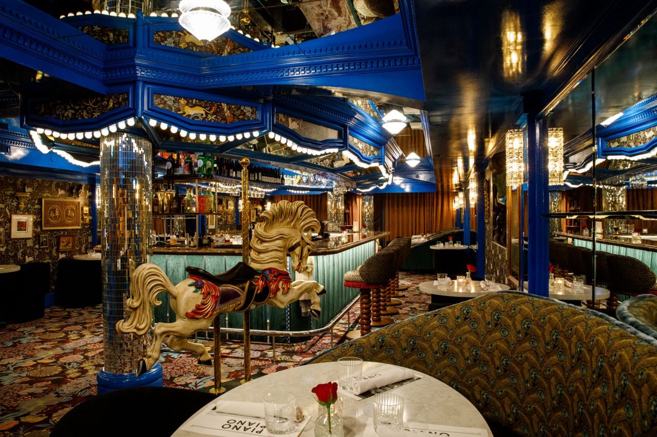 Circus-themed bar with a merry-go-round horse as decoration