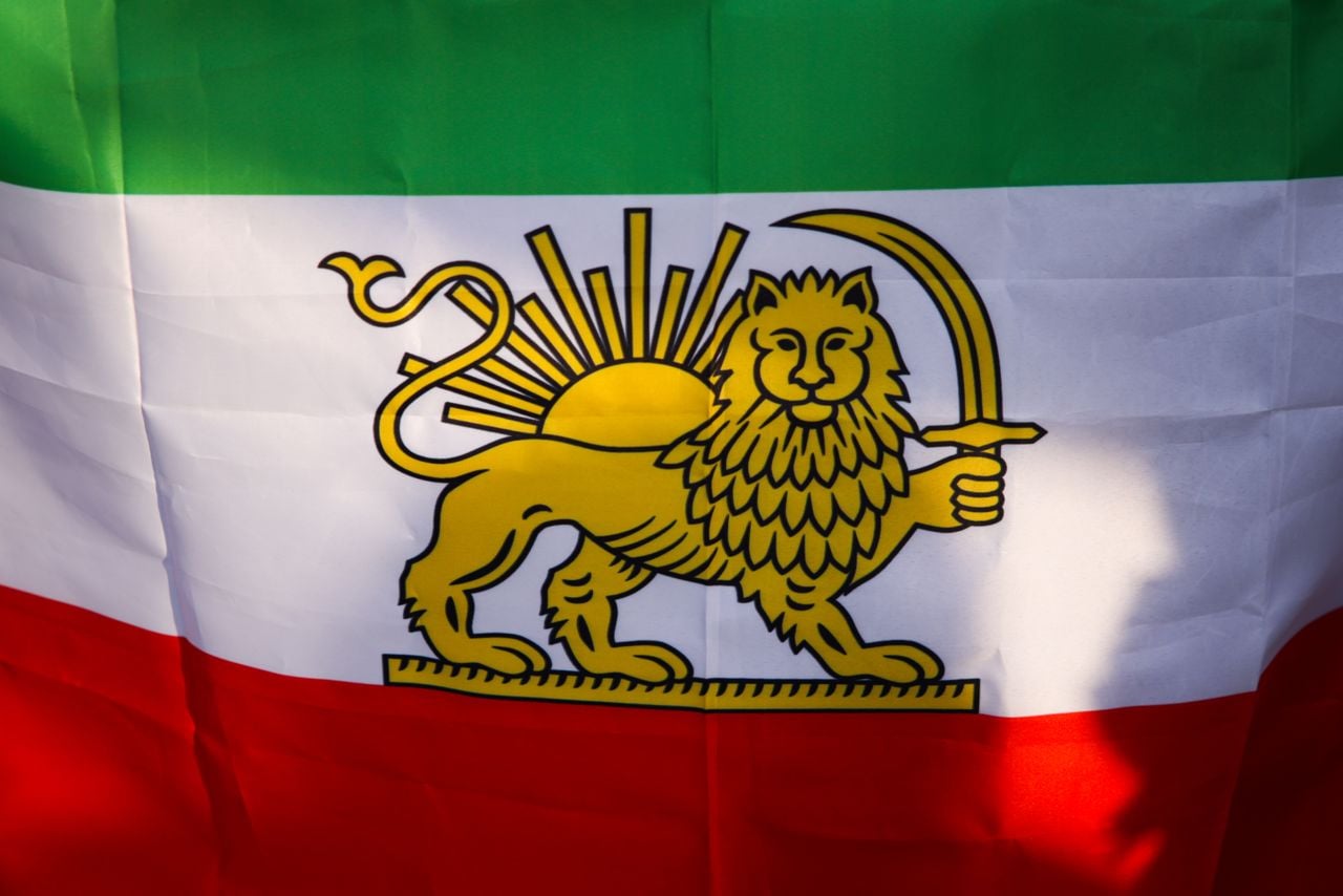 The Iranian Lion and Sun flag.