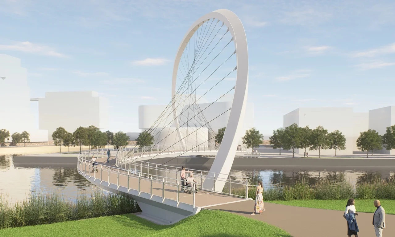 A curvy new pedestrian bridge will link the central waterfront to the Port Lands