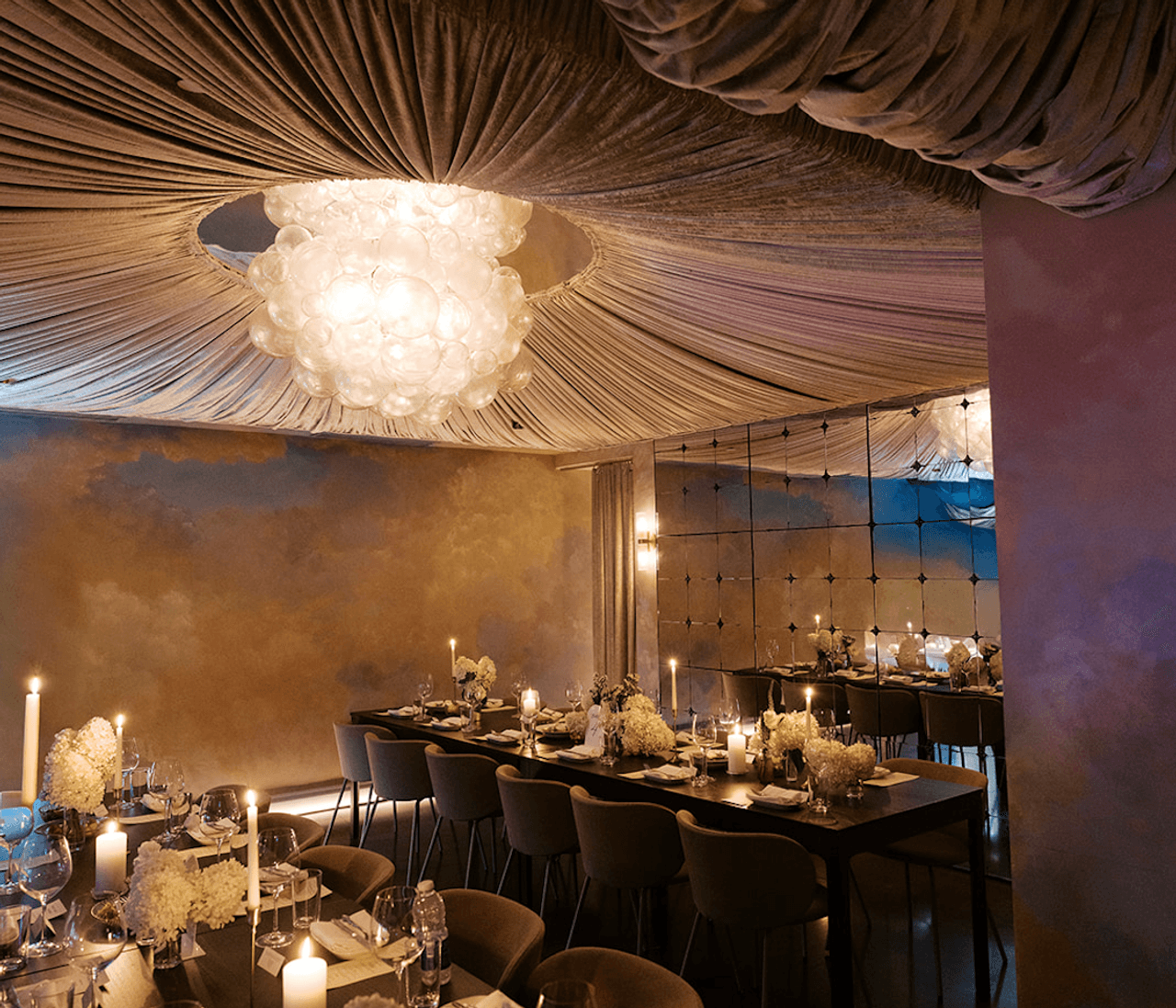 Restaurant in a plush room with fabric ceilings