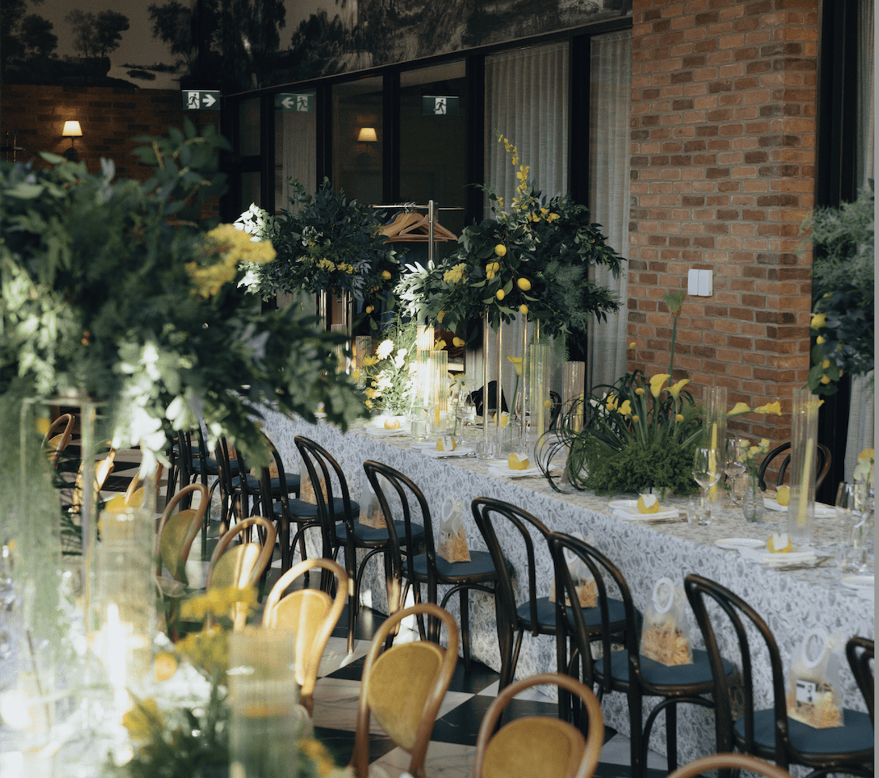Restaurant tables covered in lush greenery